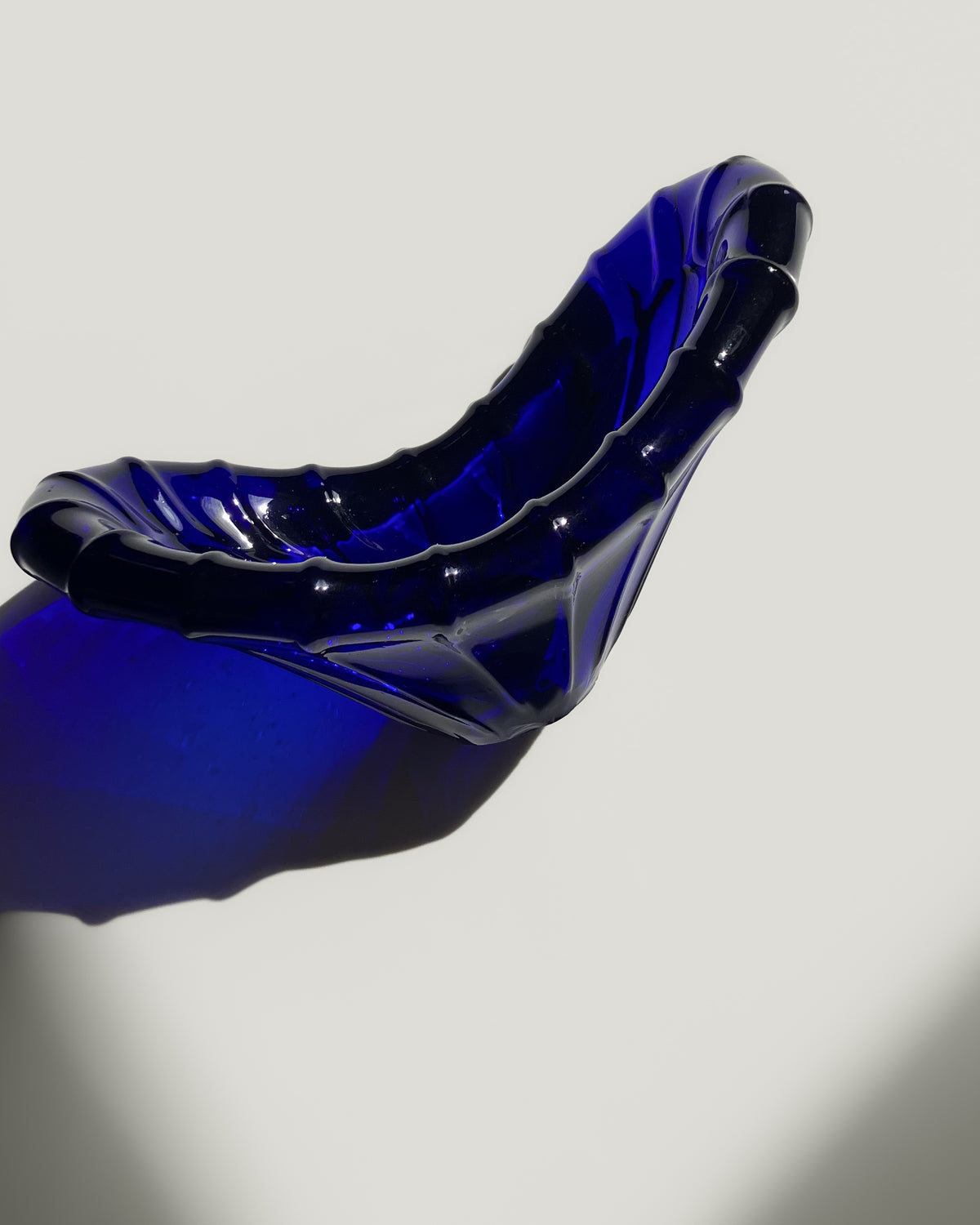 Cobalt blue v-shaped glass bowl