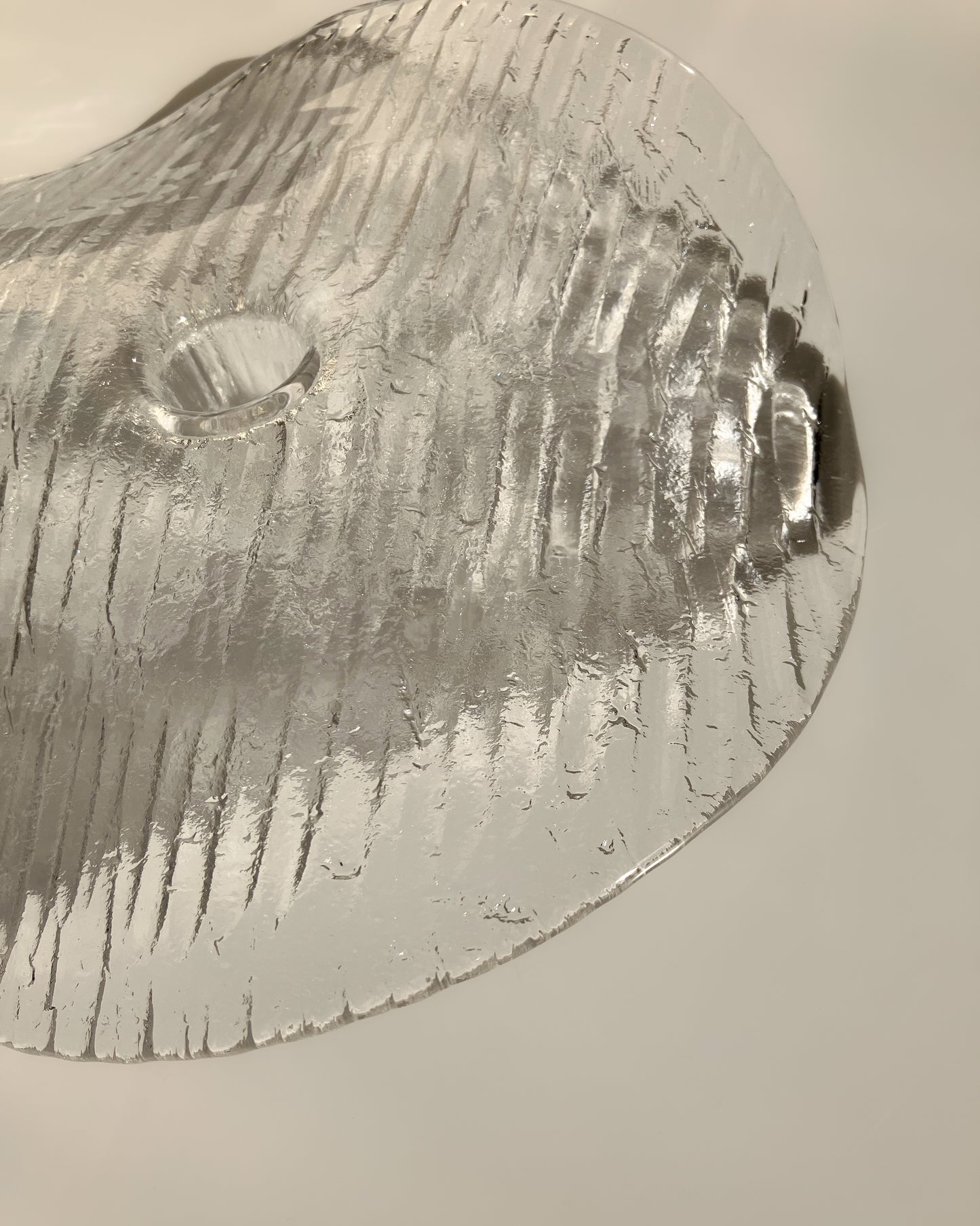 Plate-shaped glass candle holder