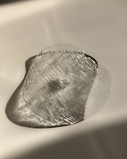 Plate-shaped glass candle holder