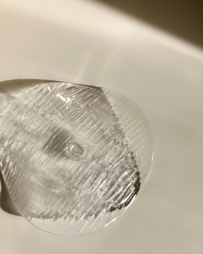 Plate-shaped glass candle holder