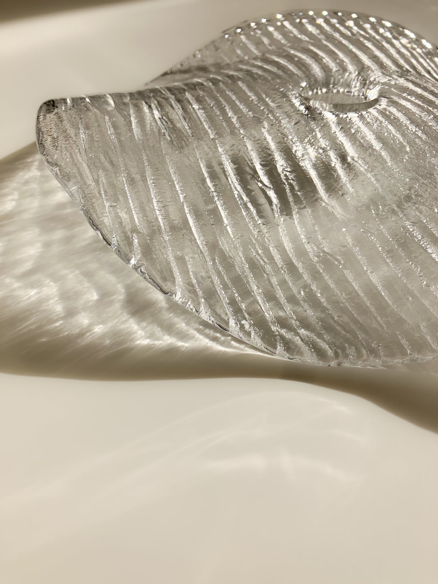 Plate-shaped glass candle holder