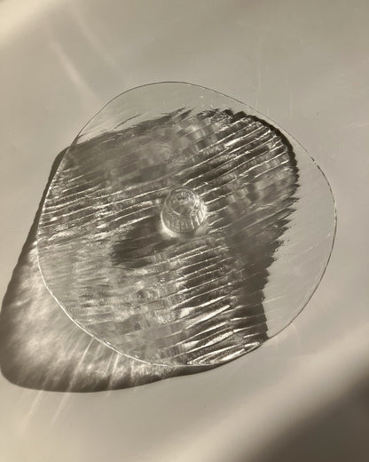 Plate-shaped glass candle holder