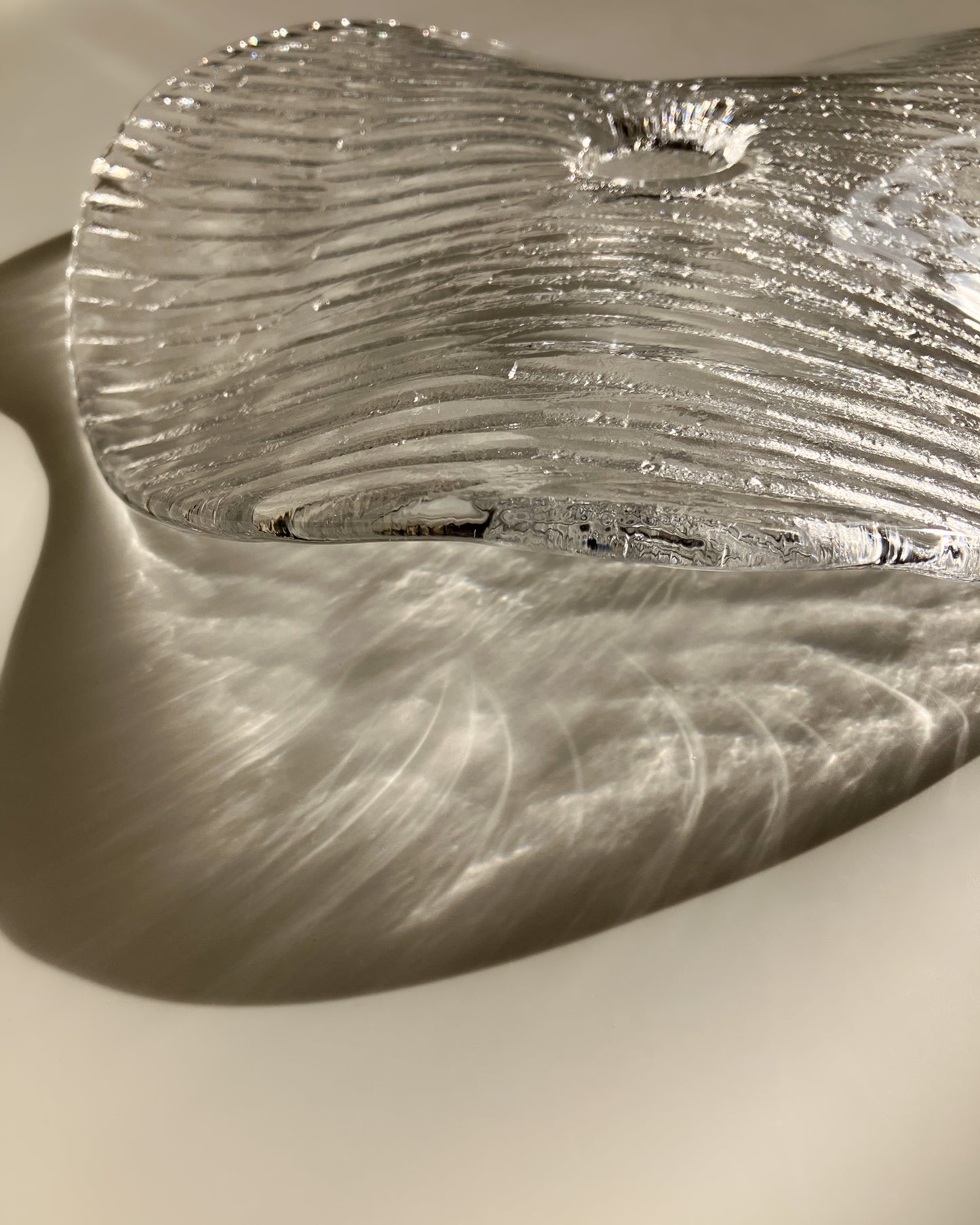 Plate-shaped glass candle holder